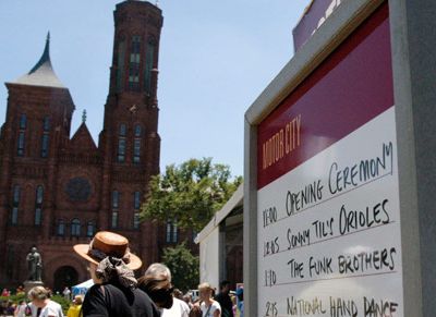 Smithsonian Castle serves as a backdrop to the the Motor City stage at the 2011 Smithsonian Folklife Festival.