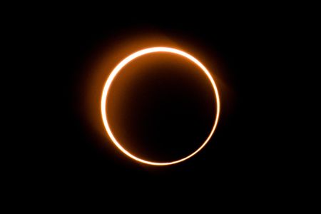 The moon moves in front of the sun in a rare "ring of fire" solar eclipse as seen from Tanjung Piai, Malaysia on December 26, 2019. 