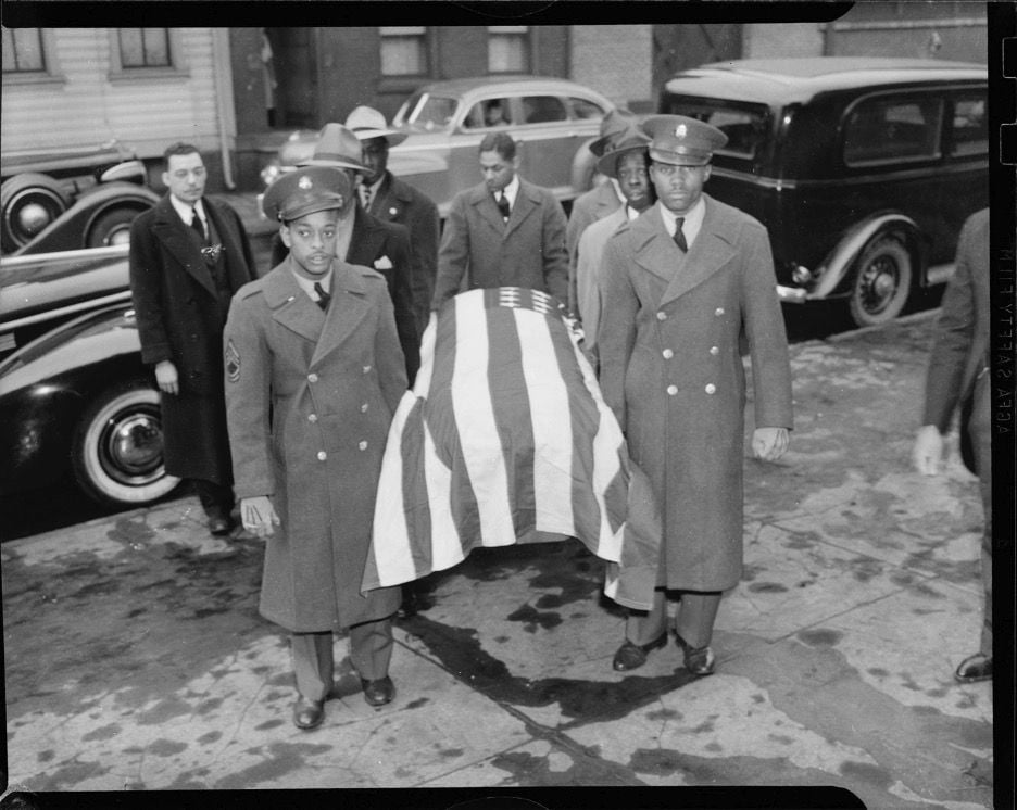 Pallbearers wearing U.S. Army uniforms