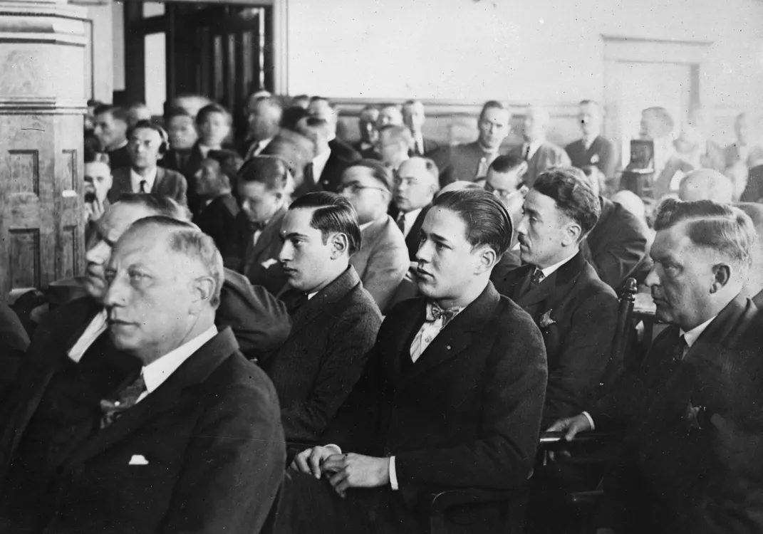 Leopold and Loeb (second row) in court