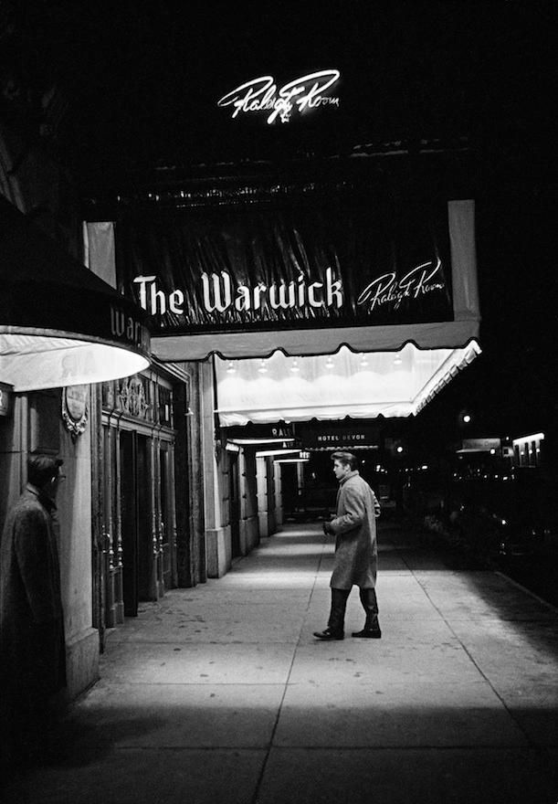 Alone, outside the Warwick Hotel