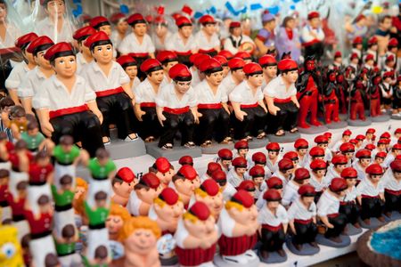 The Catalan Nativity character known as Caganer in the Santa Llucia Christmas Market, Barcelona, Spain.
