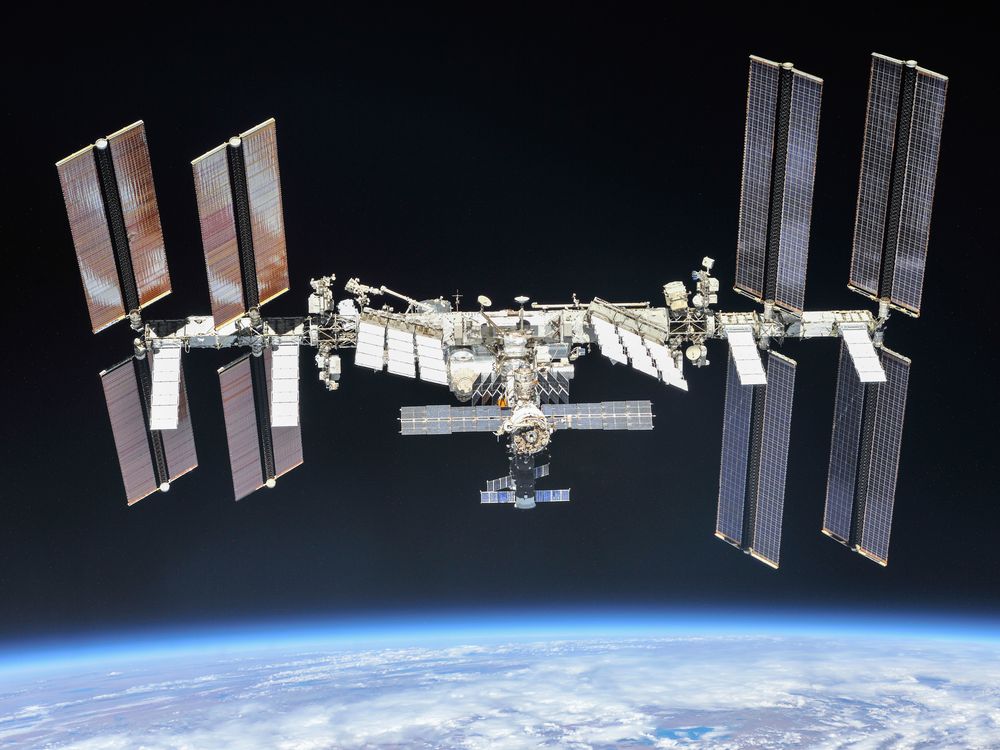 Image of the International Space Station photographed by Expedition 56 crew members on Oct. 4, 2018 above the horizon of Earth