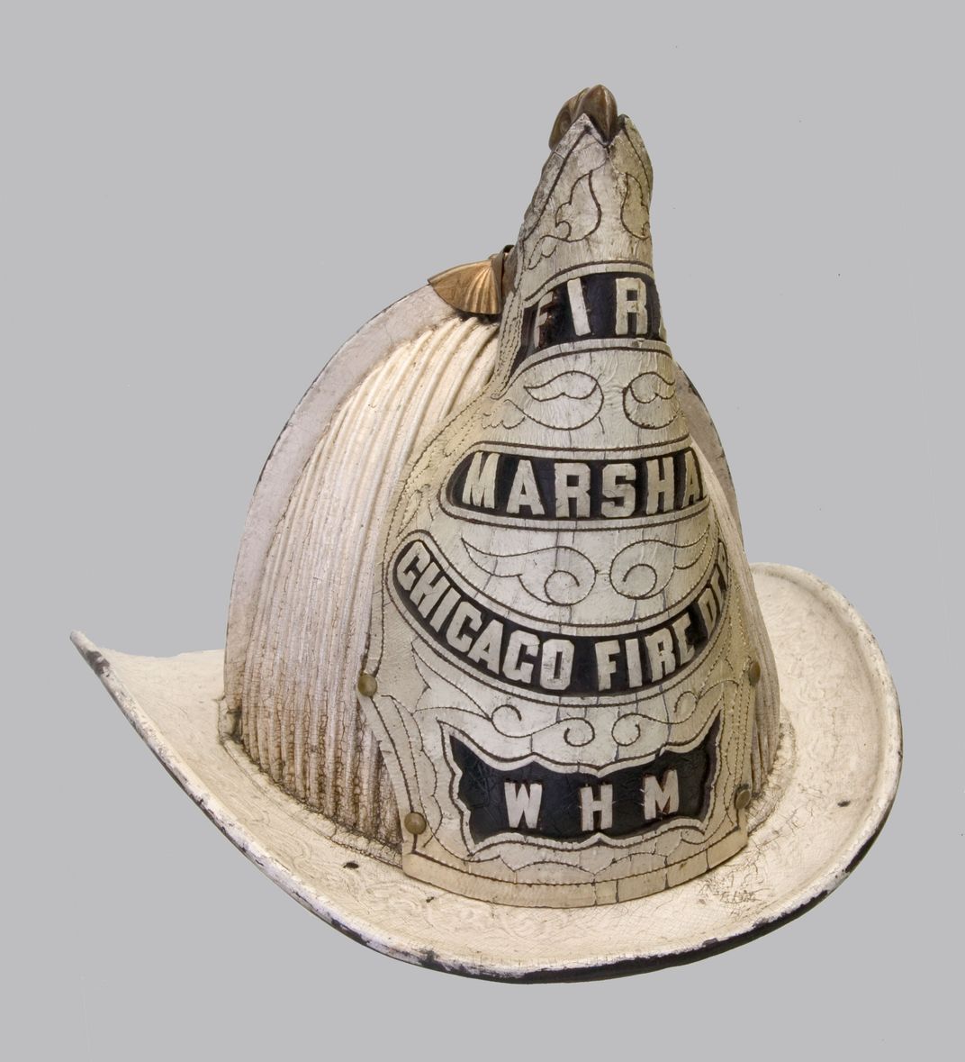 A Fire marshall's white peaked hat