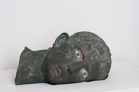 The toppled head of Augustus spent centuries buried underneath the door to an invading force's victory shrine