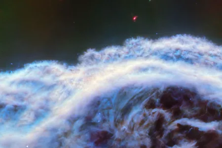 A close-up of the &quot;mane&quot; of the Horsehead Nebula, located some 1,300 light-years from Earth. This view was captured by the James Webb Space Telescope&#39;s Mid-Infrared Instrument.