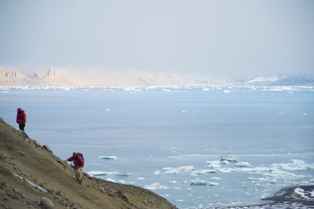 Chris Torres and Eric Gorscak take in the scenery at Cape Lamb—scenery that included lots of fossils. 