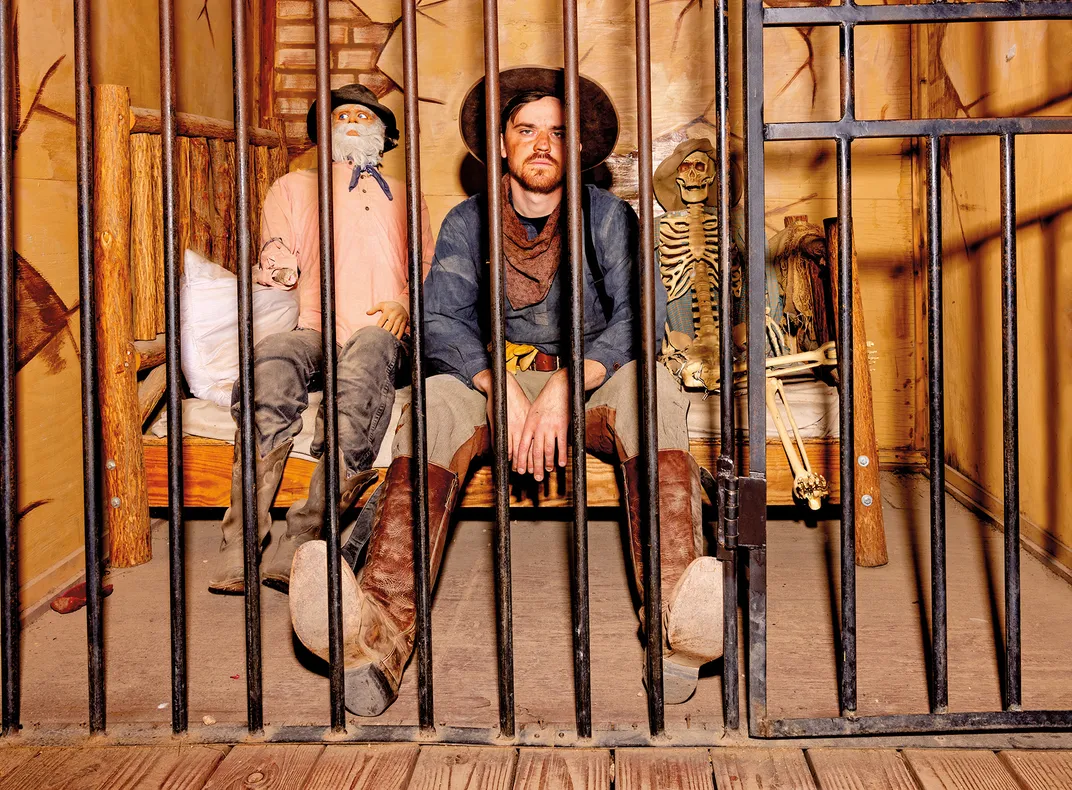 Cade McKechnie sits in a jail cell