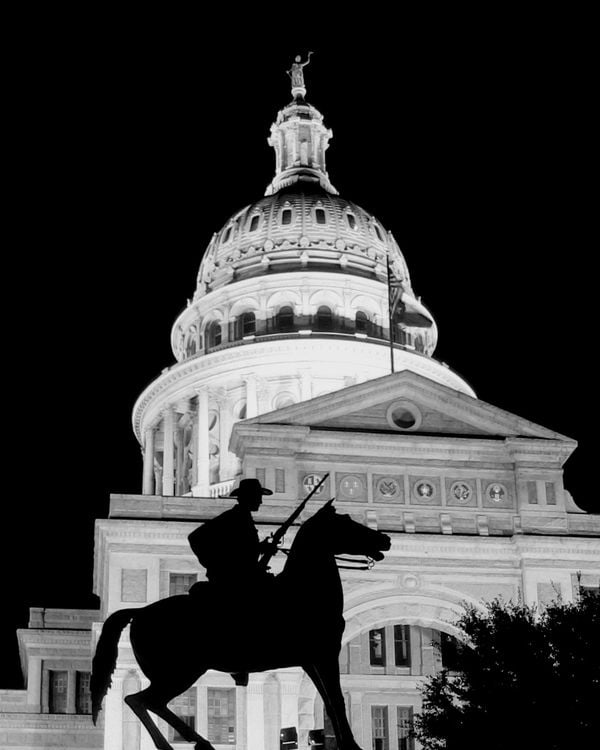 Silhouette in front of Texas State Capital in Austin thumbnail