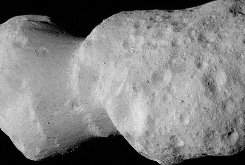 a close-up of a grey asteroid