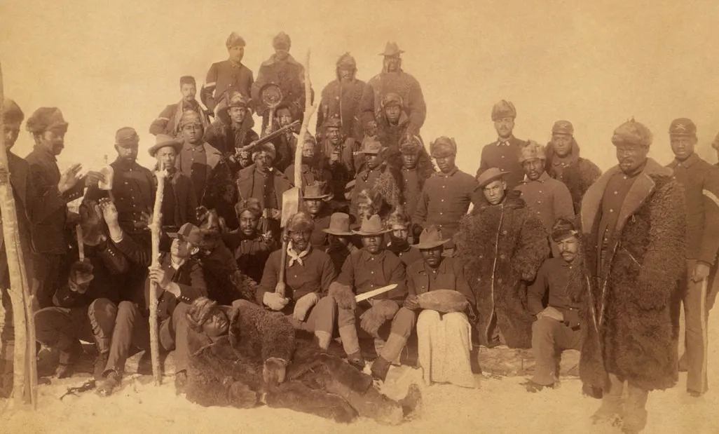 Buffalo soldiers of the 25th Infantry, some wearing buffalo robes, Ft. Keogh, Montana