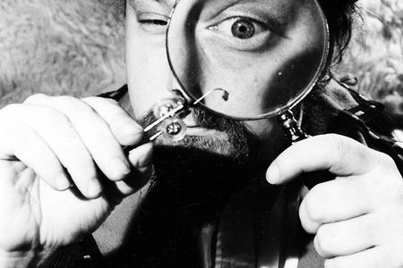 Gertsacov looking at one of his fleas.