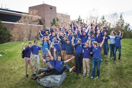 Lab rats triumphant: System leads and mission managers at the University of Buffalo campus cheer after learning that the nanosat lab got the go-ahead for three projects.