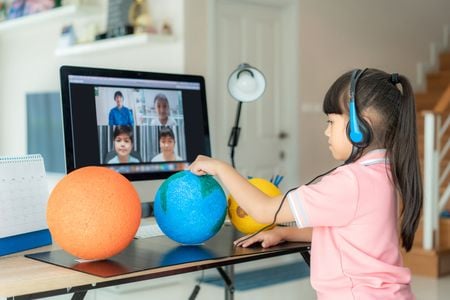 When the 2020-2021 school year started, 39 of the nation’s 50 largest school systems were among those that chose a distance learning instructional model. (ake1150sb/iStock/Getty Images Plus)