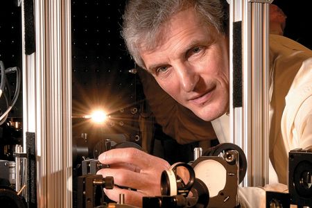 Bright idea: Wolfgang Ketterle (in his M.I.T lab) hopes to discover new forms of matter by studying ultracold atoms.