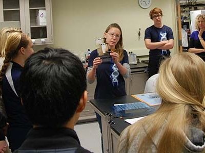 Technician Maggie Halloran explains to a group of high school students how DNA sequencing works at the National Museum of Natural History’s new Laboratories of Analytical Biology (LAB), a molecular biotechnology hub.