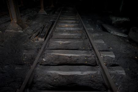 Railway tracks lead into a dark underground shaft in a former mine in Walbrzych, Poland near where amateur treasure hunters say they have found a lost Nazi train full of gold.