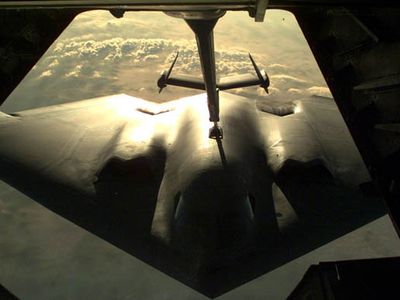 A B-2 Spirit being refueled by a KC-10 aircraft.
