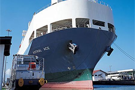 Electric towing locomotives guide the Astral Ace through the Pedro Miguel Locks. Says lockmaster Dagoberto Del Vasto, who began as a janitor and has worked at the canal for 22 years, of Panama's four-year stewardship of it: "I am very, very, very proud."
