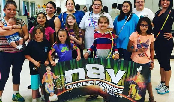 N8V Dance Fitness instructor Michelle Reed (far right) poses with participants of the Hannaville Indian Community of Michigan (Photo used with permission, courtesy of Michelle Reed)
