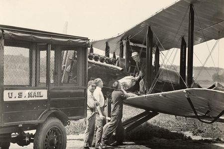 Loading mail onto a de Havilland DH-4 mail plane, Omaha, Nebraska, mid-1920s