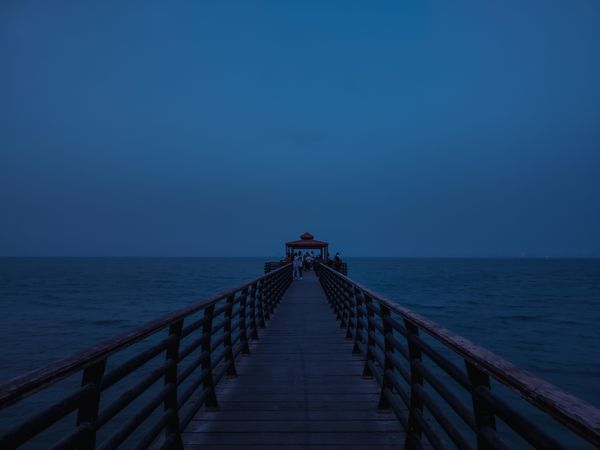 The ocean meets the sky at the pier thumbnail