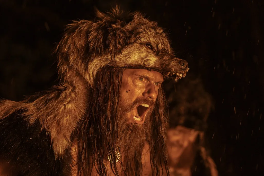 Alexander Skarsgård as Amleth, wearing an animal skin hood