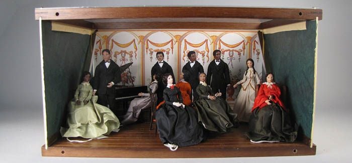 Diorama of singers on a small stage