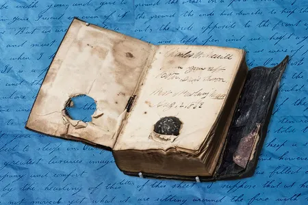 &ldquo;Had it not been for the testament given [to] him by Mr. Foster, which received a second bullet, I doubt if you would have ever seen him again,&rdquo; wrote journalist Benjamin Perley Poore in a letter to Merrill&#39;s father.