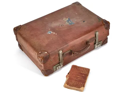 The suitcase was likely made in the 1920s.