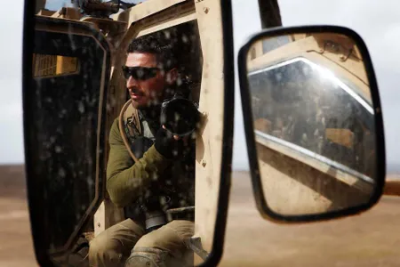 A photographer with Reuters, Finbarr O’Reilly, in southern Afghanistan’s Helmand province during 2011