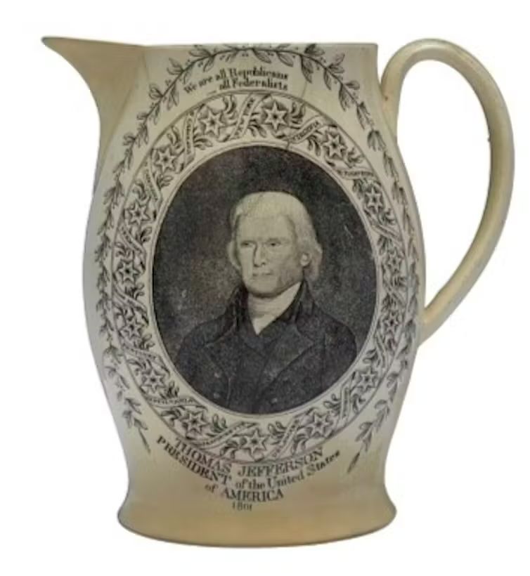 cream colored pitcher with image of Thomas Jefferson