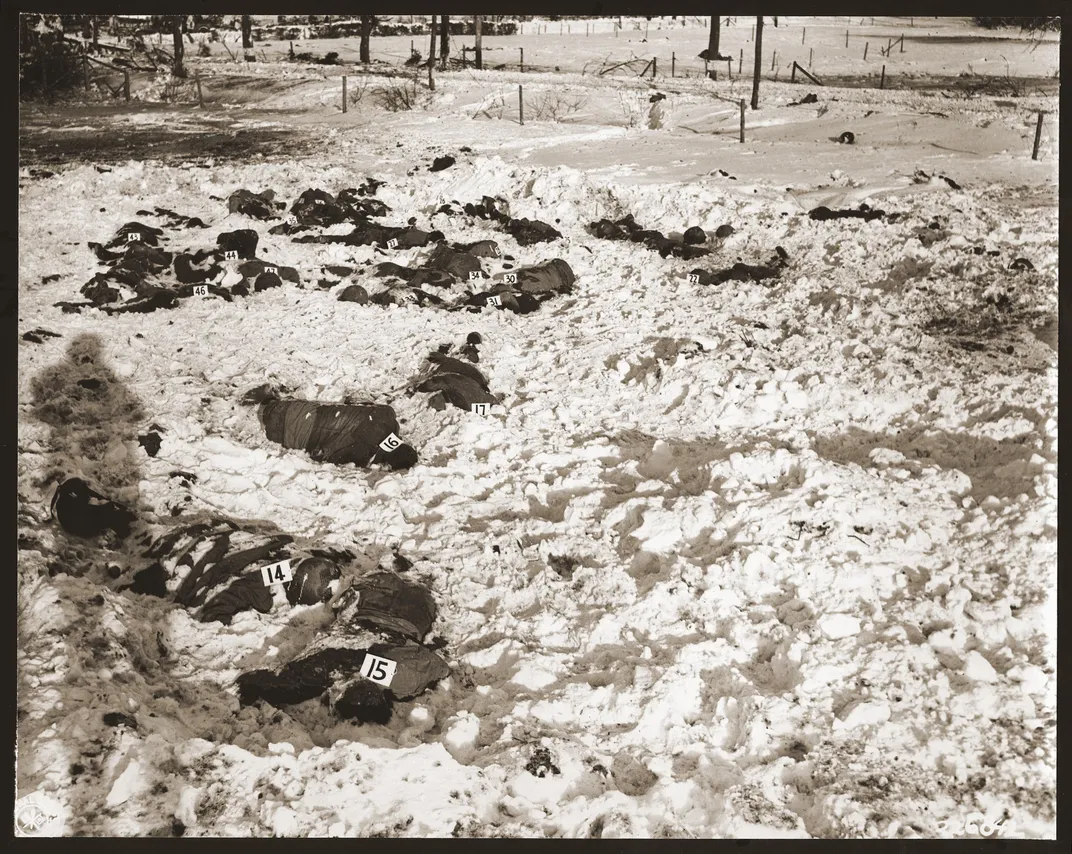 The remains of American prisoners of war murdered in December 1944 near the Belgian city of Malmedy. The bodies were identified by number for use in war crimes trials brought against more than 70 Nazi soldiers by the U.S. military.