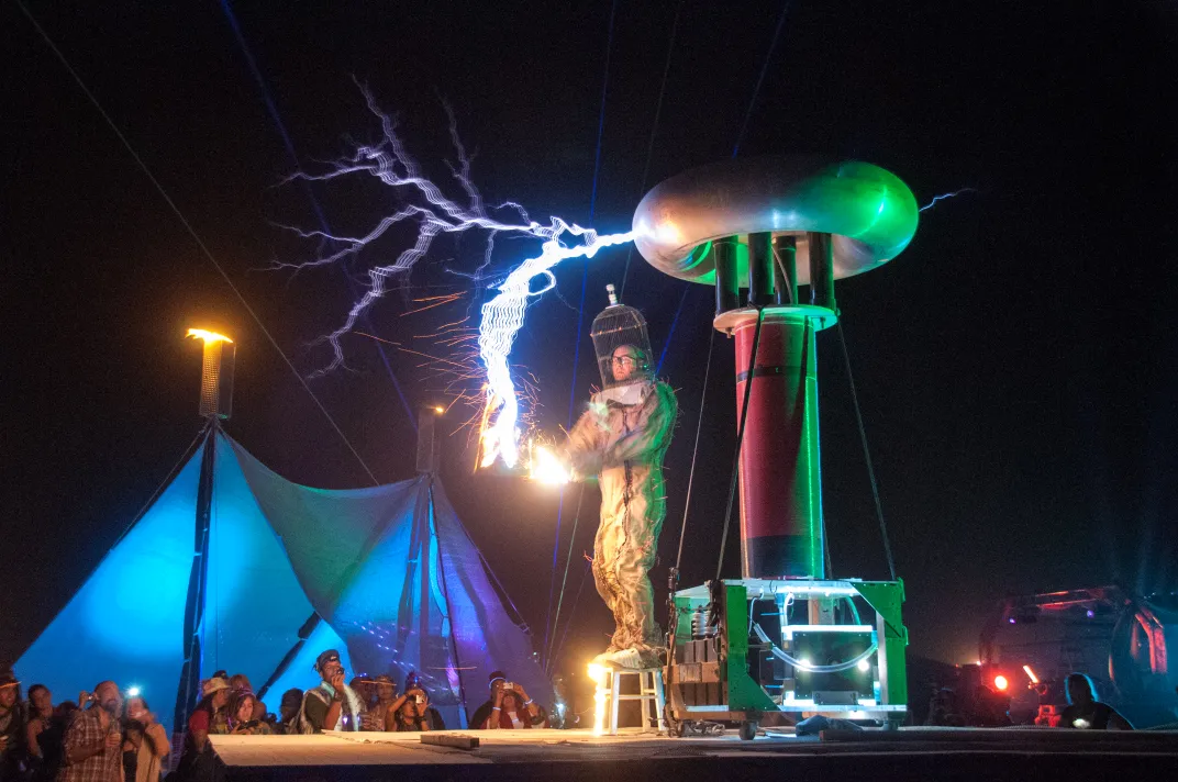Richards, in character as Doctor Megavolt, performs at Burning Man in 2011.