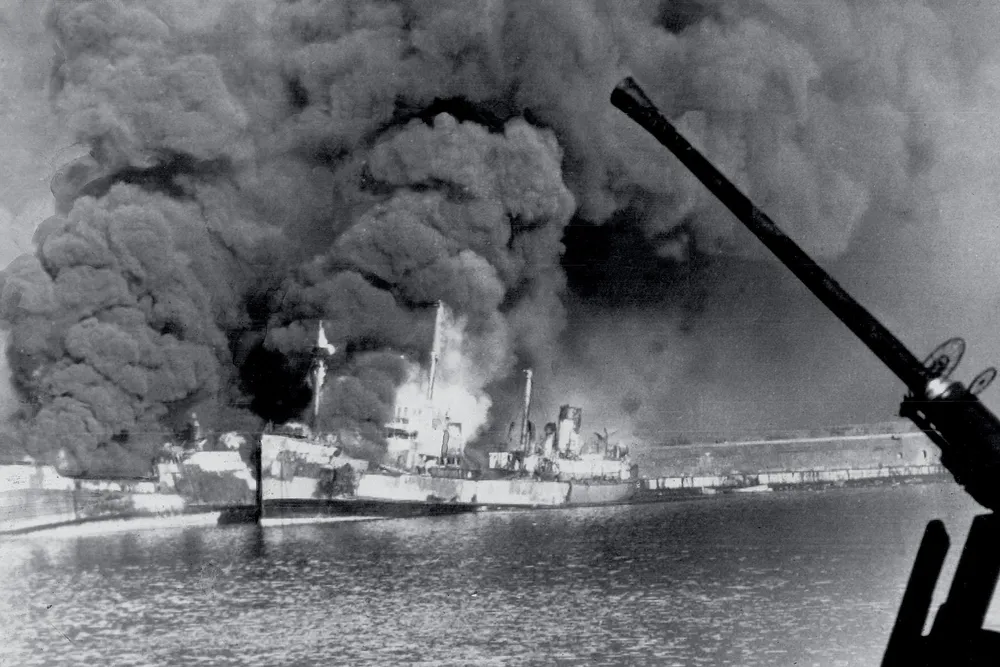 SOCIAL - Allied freighters ablaze in the harbor of Bari, Italy, after the German attack.