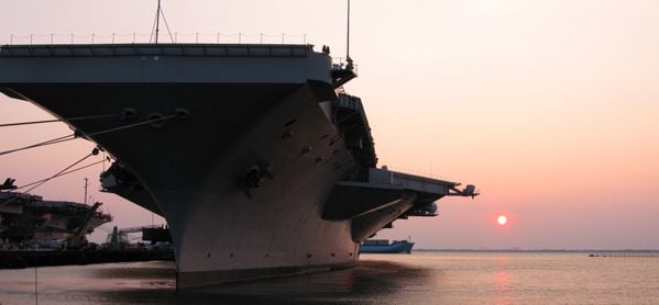 USS Truman at sunset thumbnail