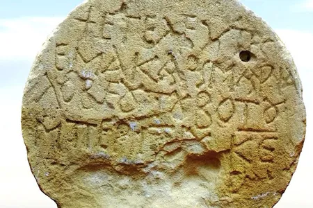 The stone reads "blessed Maria, who lived an immaculate life."