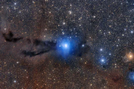 The most detailed image ever taken of Lupus 3, a dense cloud of gas and dust that collapses to create new stars. This image is a compilation of data from the VLT Survey Telescope and the MPG/ESO 2.2-metre telescope.