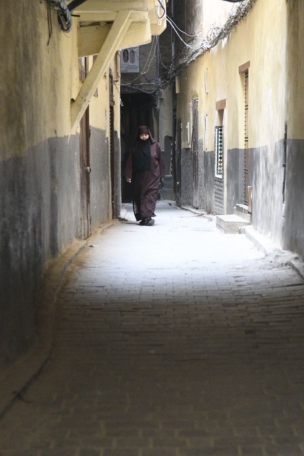 Woman walking in Fes thumbnail