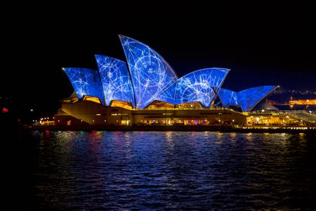 Lighting the sails at the Sydney Opera House.