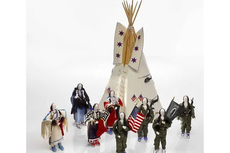 Smithsonian curator Emil Her Many Horses, an artist trained both in traditional beadwork and in doll-making, created a commemorative tableau featuring miniature figures of Vietnam-era veterans and the tribal women who welcomed them home with ceremonies.