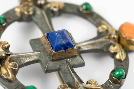 The brooch was designed by Victorian architect and artist William Burges.
