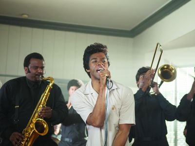 Craig Robinson, left, as Maceo Parker and Chadwick Boseman as James Brown in "Get on Up", the incredible life story of the Godfather of Soul, from director Tate Taylor.