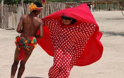 Two Wayuu dancers from La Guajira Province in northern Colombia perform a courtship dance.