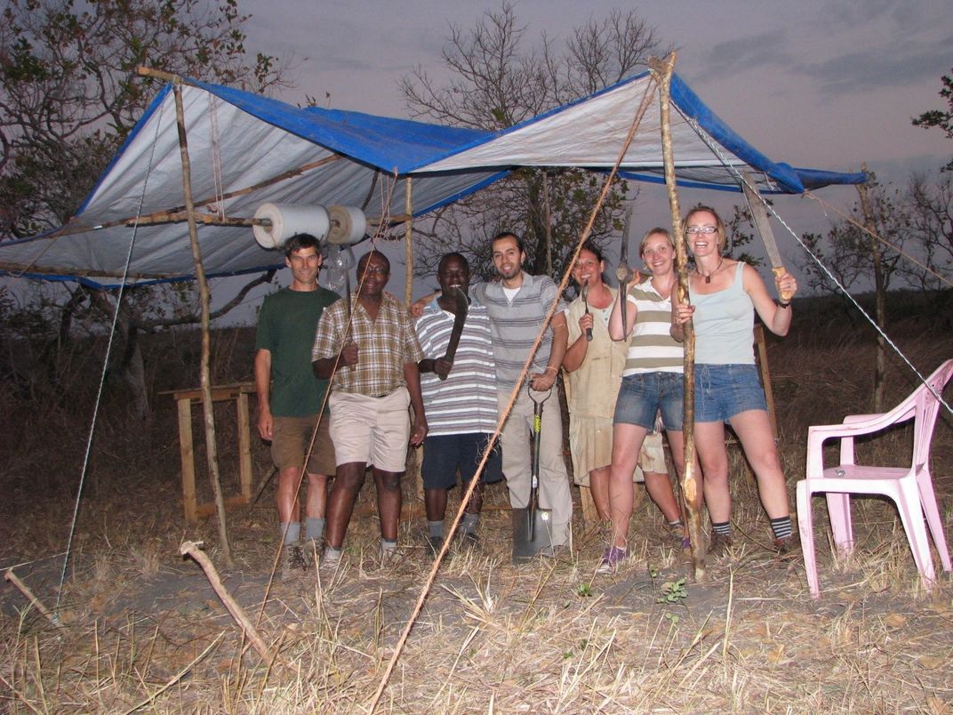 People under a tent.