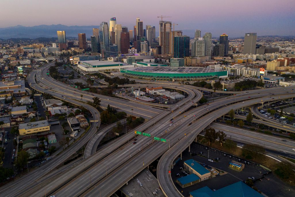 An aerial view of extremely light traffic on Los Angeles' 10 and 110 freeway interchange.