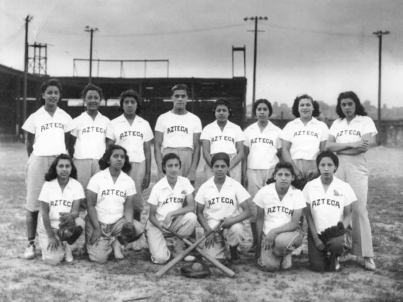 Black and white photo of women's baseball team