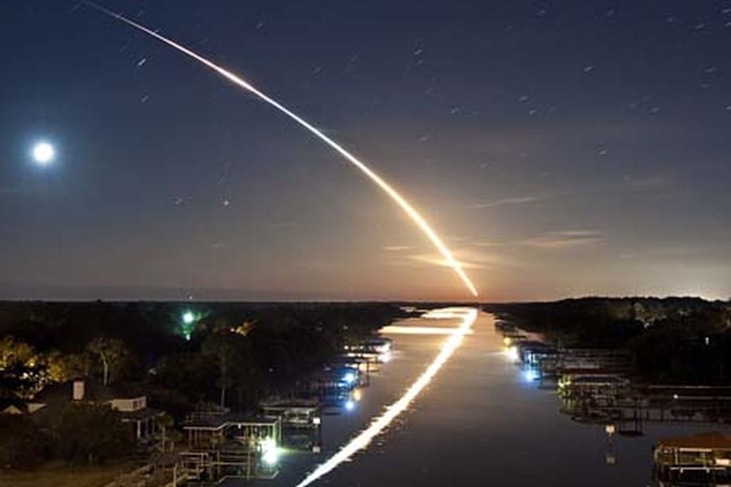 STS-130-reflection-flash.jpg