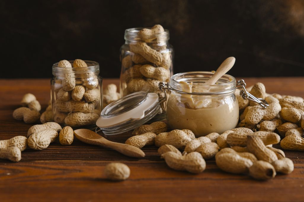 Peanuts and peanut butter on a table