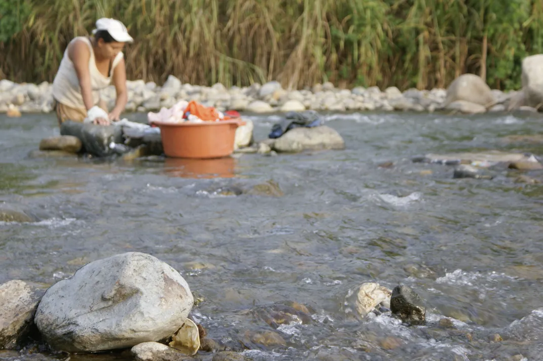 Woman Washing Clothes In The Babahoyo River Smithsonian Photo 